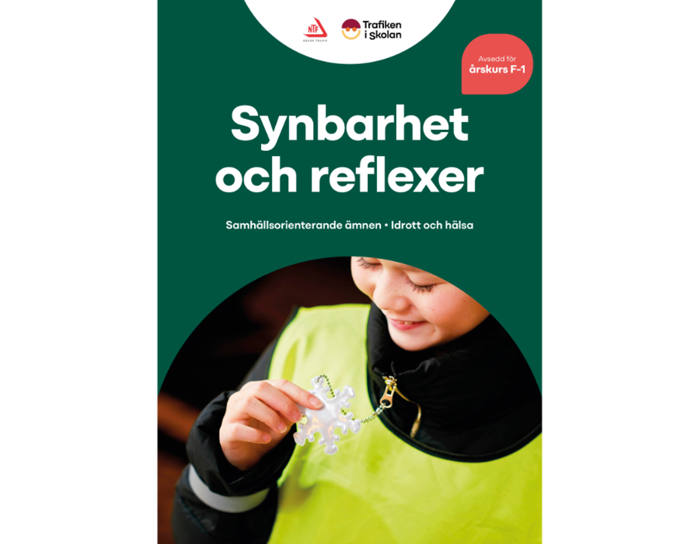 Skolbarn som håller i reflex.